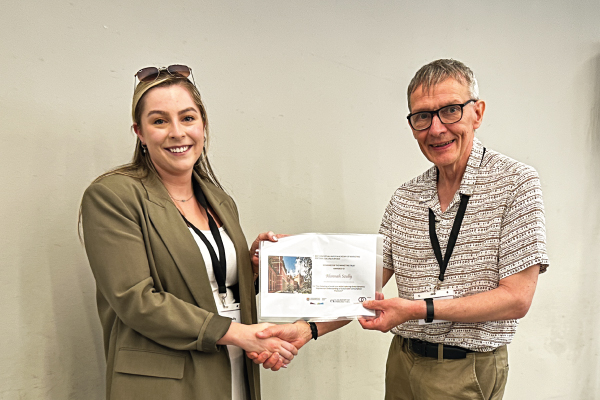 AM2023 Doctoral Colloquium Best Conceptual Paper, presented to Alannah Scully by Nigel Coates, Chair of the Marketing Trust
