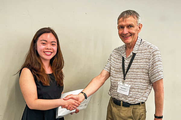 AM2023 Doctoral Colloquium Best Paper, presented to Jordan Truong by Nigel Coates, Chair of the Marketing Trust